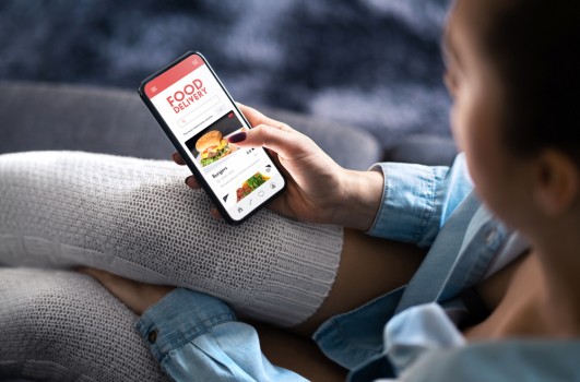 Food,Delivery,App,In,Mobile,Phone.,Restaurant,Order,Online.,Woman Food,Delivery,App,In,Mobile,Phone.,Restaurant,Order,Online.,Woman