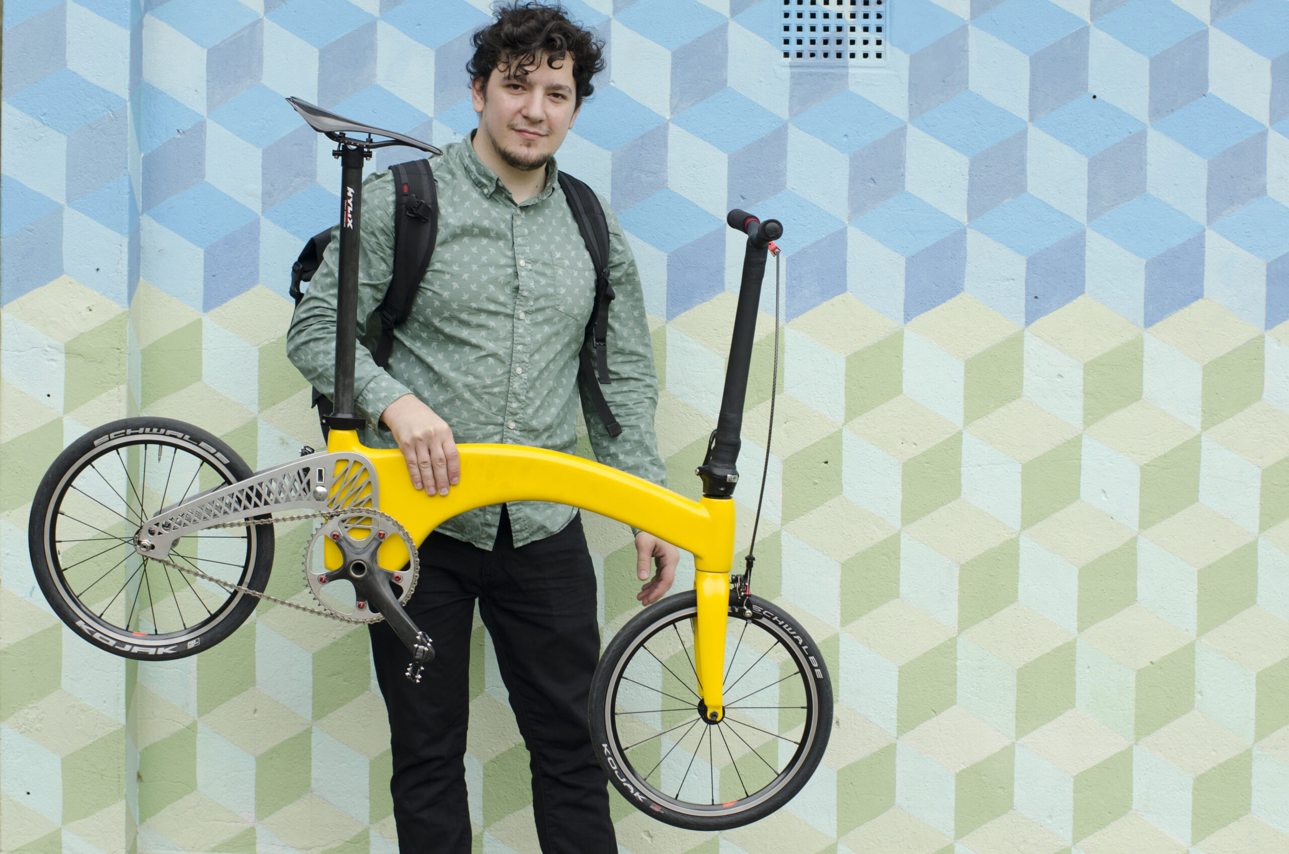 Petre holding bike